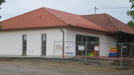 Der Krippenanbau am Kindergarten Alsmoos wird eingeweiht. 
