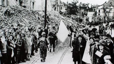 Ende April marschierten amerikanische Besatzungstruppen in München ein, Zeitzeugen erinnern sich. 