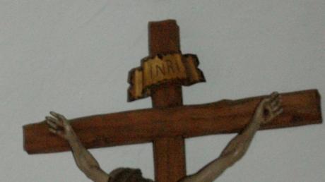Das Altarkreuz in der Kirche St. Nikolaus von Flüe.  	