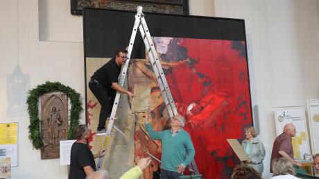 Ein vier Meter hohes Lutherporträt entstand aus 95 Teilen, die die Zuschauer selbst zusammensetzten. Es war eine Kunstaktion, angestoßen von Michael Apitz.