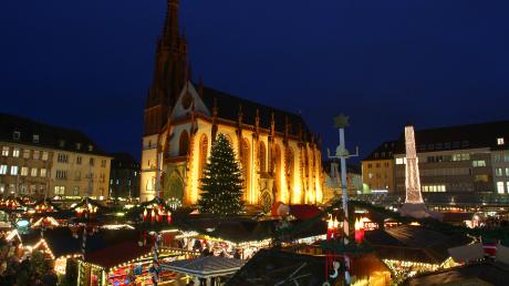 Wir haben alle Infos über die Weihnachtsmärkte 2023 in Unterfranken für Sie inklusive Orte, Termine und Öffnungszeiten. Im Bild: Die Marienkapelle und der Weihnachtsmarkt Würzburg.