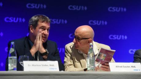 Die Affäre um den früheren Justizminister Alfred Sauter (rechts) wird auch für CSU-Chef Markus Söder zum Risiko.