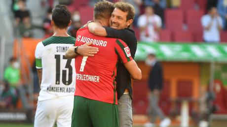 Wollen am Samstag wieder jubeln: Die Augsburger Florian Niederlechner und Markus Weinzierl. Lars Stindl dagegen fehlt den Gladbachern diesmal verletzungsbedingt.