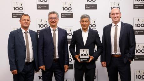 Aumüller Aumatic erhält den Innovationspreis bereits zum siebten Mal in Folge: (von links) Jürgen Sattich, Norbert Holzhammer, Ranga Yogeshwar und Alexander Birner.