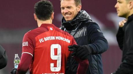 Sind mit dem FC Bayern klar auf Titelkur: Trainer Julian Nagelsmann und Torjäger Robert Lewandowski.