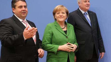 Es ist geschafft: Sigmar Gabriel, Angela Merkel und Horst Seehofer unterzeichneten gestern in Berlin den Koalitionsvertrag.
