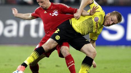 Werden sich vermutlich am Samstag wieder beharken: Dortmunds Jakub Blaszczykowski und Münchens Franck Ribéry.