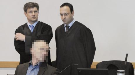 Die beiden angeklagten Brüder im Polizistenmord-Prozess. Raimund M. (links) ud Rudi R. (rechts). Archivbild
