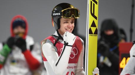 Er kann es selbst kaum glauben: Andreas Wellinger gewinnt im Skispringen die zweite Goldmedaille für Deutschland. 