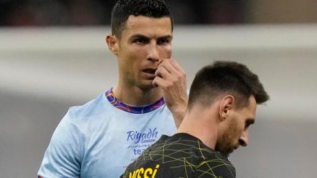 Cristiano Ronaldo (l) und Lionel Messi spielten beide lange in der spanischen Primera Division.