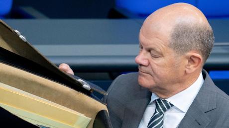 Mappe auf, Kasse leer? Finanzminister Olaf Scholz will eine gemeinsame europäische Steuer auf Aktiengeschäfte einführen. Eine Mehrheit dafür ist allerdings noch nicht in Sicht. 