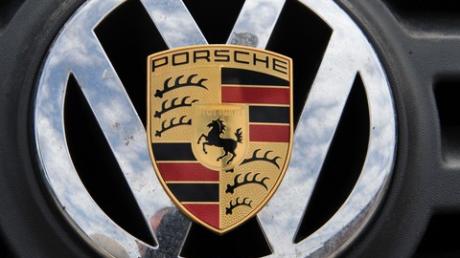 Bildliche Porsche-Übernahme durch VW.