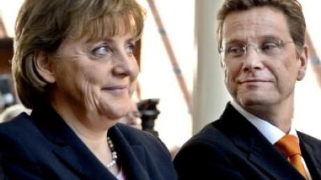 Merkel will mit FDP Krise bewältigen