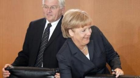 Analyse: Licht und Schatten für Merkel wie Steinmeier