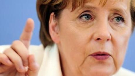 Ausstiegsdrohung - Merkel kritisiert Atomkonzerne
