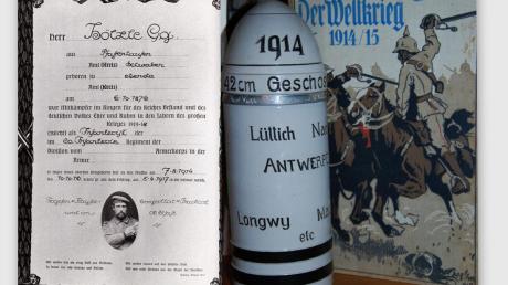 Ein Bierkrug in Form eines 42-Zentimeter-Geschosses und das Ehrenbuch sind Pfaffenhauser Erinnerungsstücke an den Ersten Weltkrieg. 
