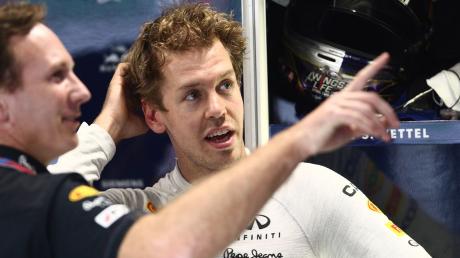 Sebastian Vettel (r) und Red-Bull-Teamchef Christian Horner im Jahr 2011.