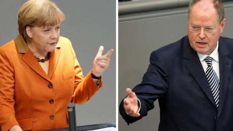 Kanzlerin Angela Merkel und ihr Herausforderer Peer Steinbrück treten am Sonntag im Fernsehen gegeneinander an. Die meisten Deutschen glauben, dass die Kanzlerin das TV-Duell für sich entscheiden wird.