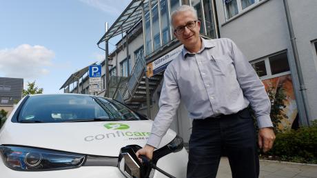 Tankt jetzt auch Storm: Joachim Vogt, Geschäftsführer des Carsharing-Anbieters Confitech.