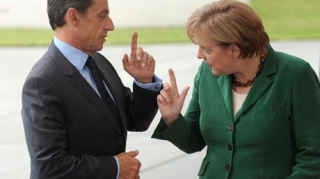 Frankreichs Präsident Nicolas Sarkozy und Bundeskanzlerin Angela Merkel (CDU) gehen in die Offensive.