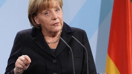 Bundeskanzlerin Angela Merkel kann sich über steigende Umfragewerte für sich selbst und die Union freuen. Foto: Wolfgang Kumm dpa