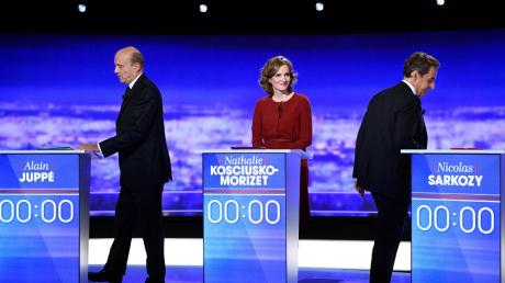 Am Donnerstagabend trafen Alain Juppé (links) und Nicolas Sarkozy (rechts) in einer Fernsehdebatte aller republikanischen Bewerber um die Präsidentschaftskandidatur aufeinander.  	