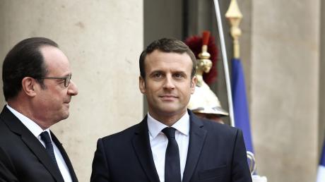 Frankreichs neuer Präsident Emmanuel Macron, Vorgänger François Hollande (links): Anders als vor fünf Jahren gab es diesmal keine Patzer.  