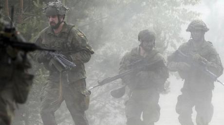 Nato-Soldaten aus Deutschland beim Manöver Saber Strike im litauischen Pabrade. 42,9 Milliarden Euro will Deutschland im kommenden Jahr in seine Verteidigung stecken.