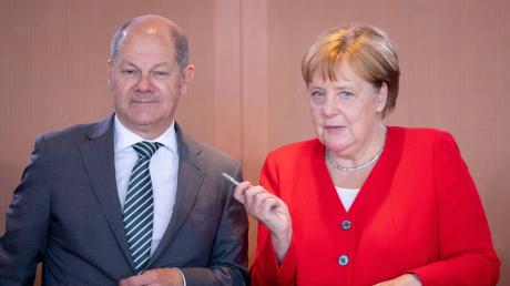Vorgängerin und Nachfolger: Angela Merkel war 16 Jahre lang im Kanzleramt zu Hause, dann übernahm Olaf Scholz die Regierungsgeschäfte.