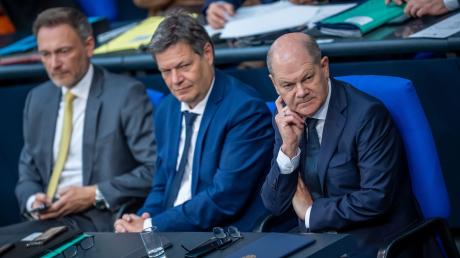 Kanzler Olaf Scholz (SPD) mit seinen Ministern Robert Habeck (Grüne) und Christian Lindner (FDP). Können die Streitpunkte um den Haushalt beigelegt werden?