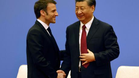 Frankreichs Präsident Emmanuel Macron trifft seinen chinesischen Amtskollegen Xi Jinping in Peking.
