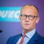 CDU-Chéf Friedrich Merz sorgt mit einer Aussage über Migranten für Empörung.